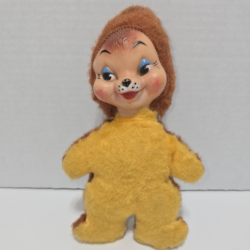 Yellow and Brown Stuffed Bear Toy